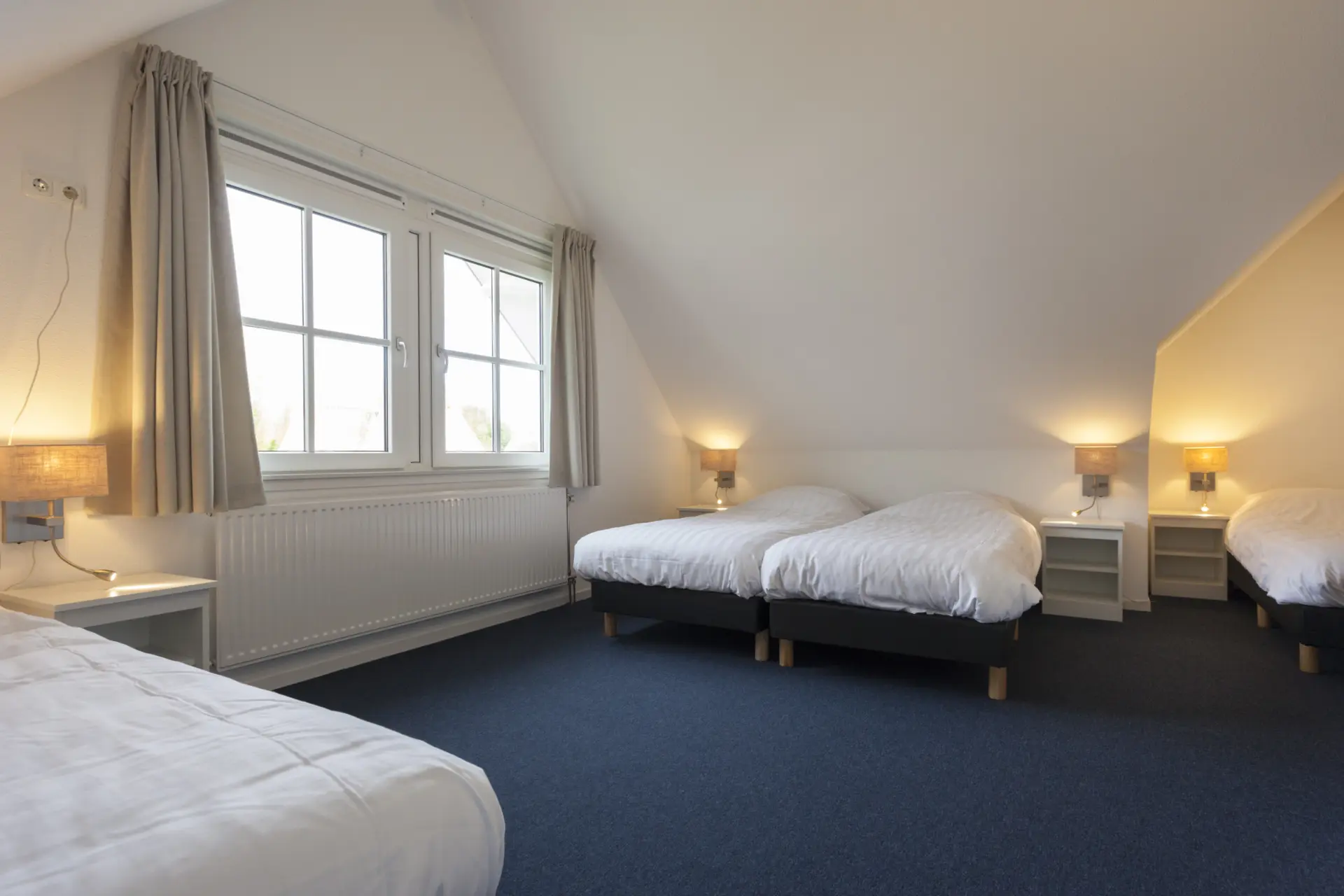 slaapkamer boven 4 bedden